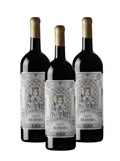 Three dark glass wine bottles with gold foil at the top and ornate white labels featuring a crowned figure and the brand name BEDORA, shown on a plain white background.