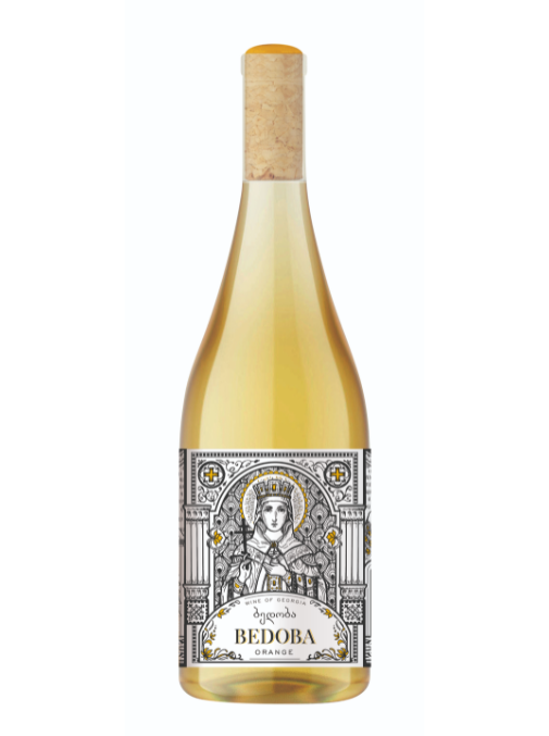 Orange wine bottle with decorative label on a white background