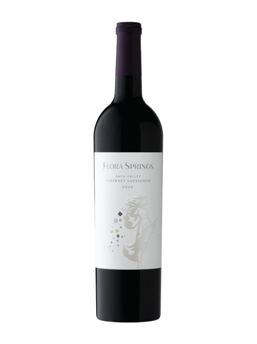 A bottle of Flora Springs Red Valley Cabernet Sauvignon 2023, featuring a white label with a gray horse illustration and a dark purple neck foil, set against a plain white background.