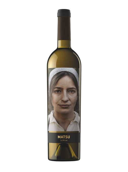 A bottle of Matsu La Rioja Spain white wine with a custom portrait label of a woman wearing a white headscarf, set against a plain white background.