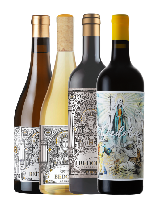 Four wine bottles with decorative labels on a white background